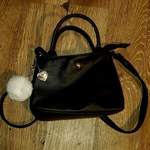 Elegant Black Handbag with Heart Charm